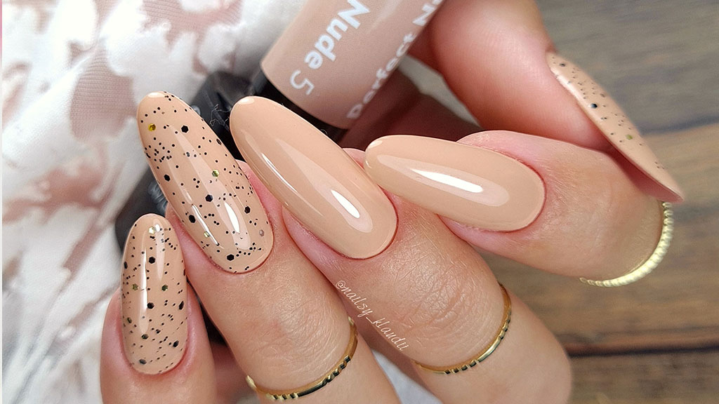 Neutral nail colours manicure with nude and soft pink gel polish