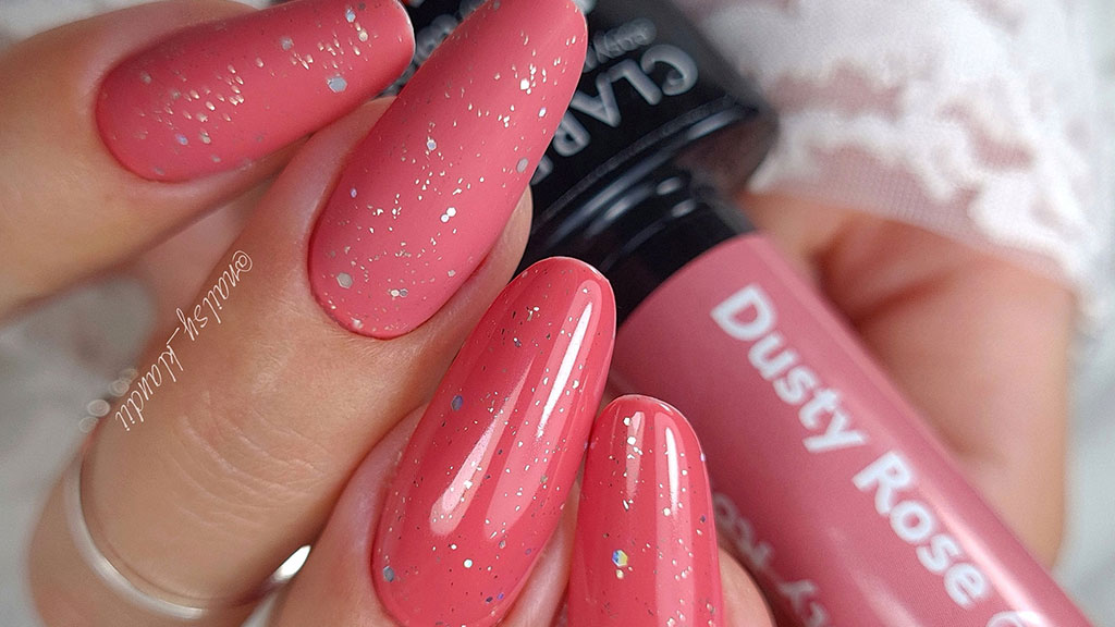 Gel nail polish manicure with glossy long-lasting finish cured under LED lamp