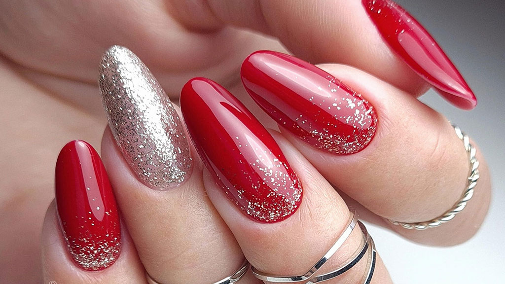 Applying Claresa red gel nail polish for a professional manicure