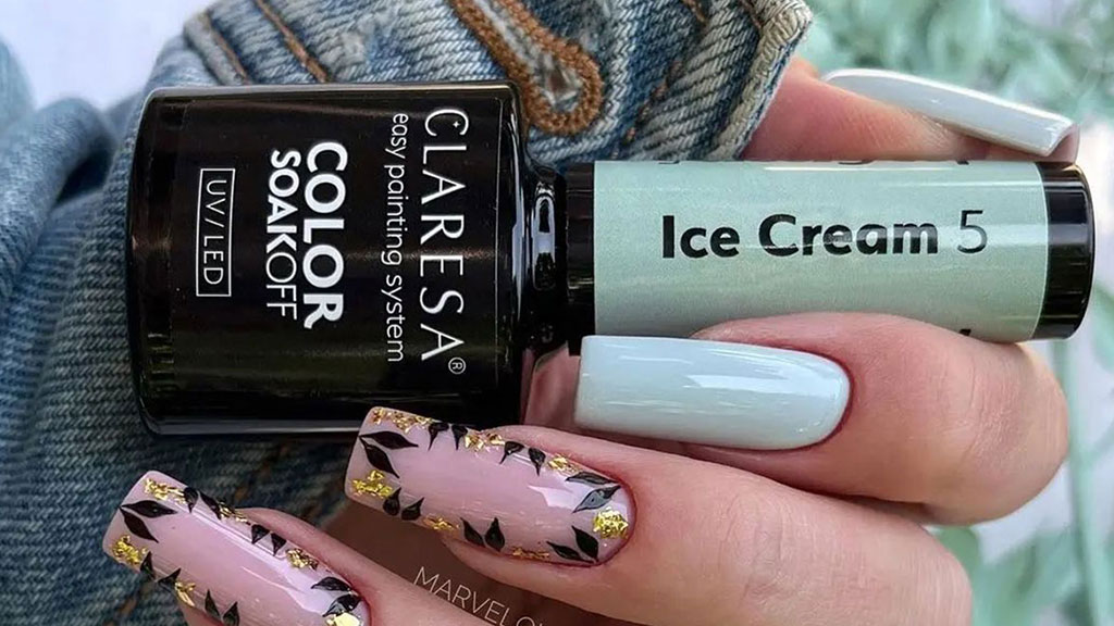 Green gel nails with a glossy finish in a modern manicure trend.