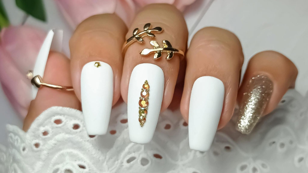 Stylish white nail design with a glossy and modern finish.