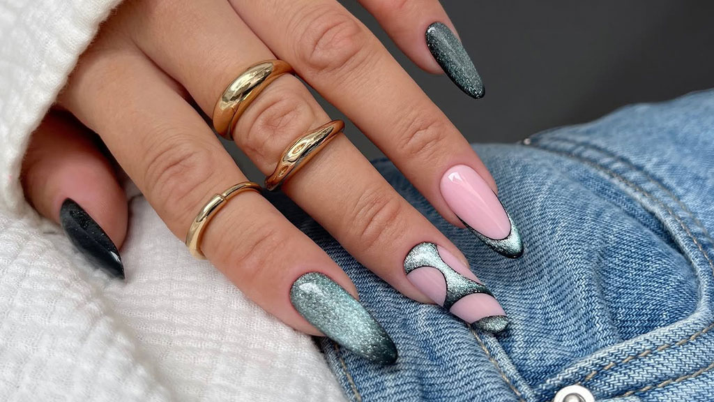 Cat eye nail gel polish manicure with a shimmering magnetic effect