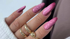 Red cat eye gel polish manicure featuring a shimmering magnetic effect created with Claresa Cat Eye Red gel polish.